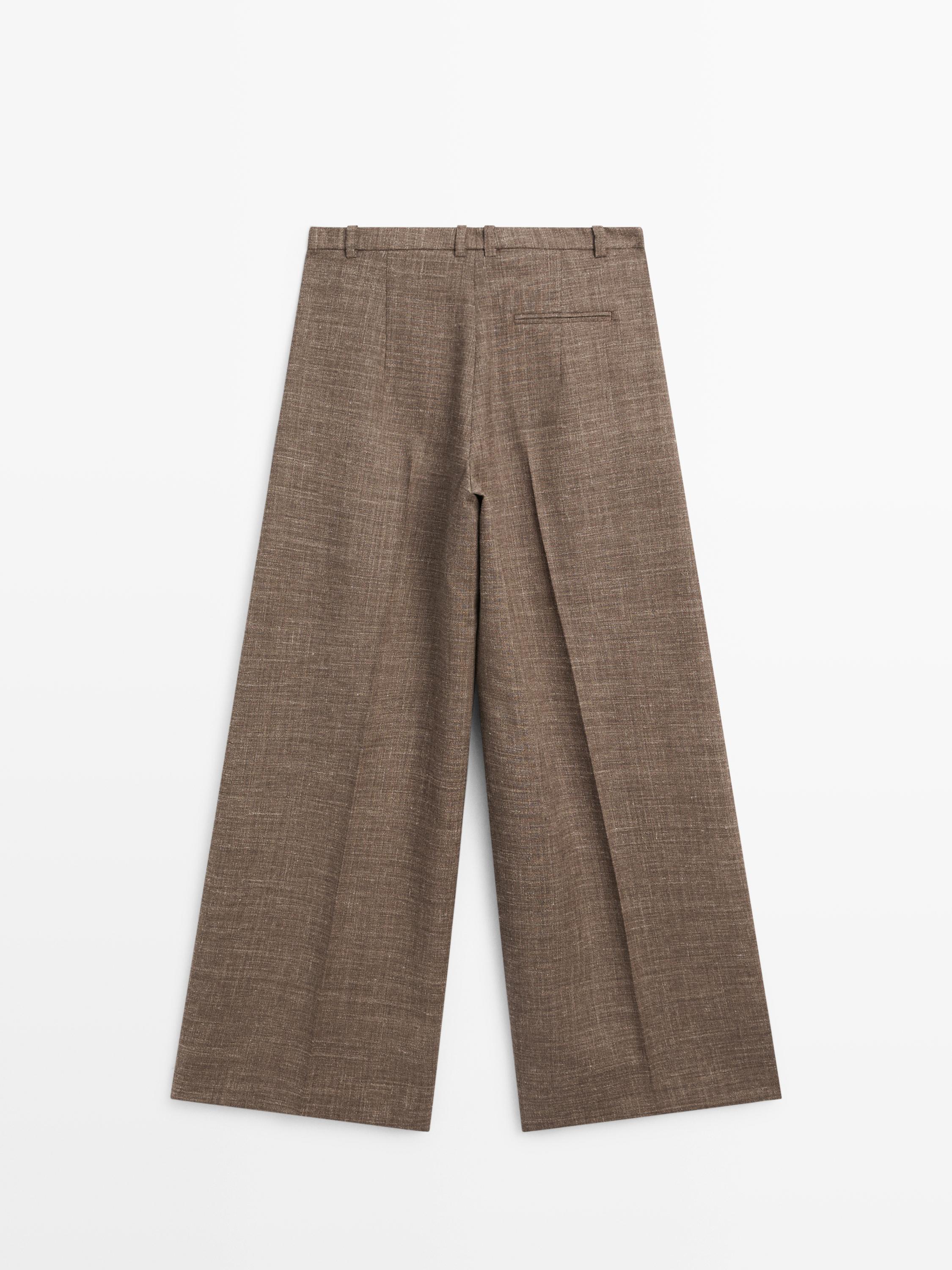 Wide-leg voluminous wool blend trousers